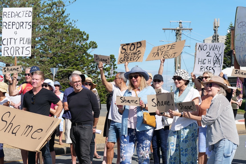 group of people with protest signs