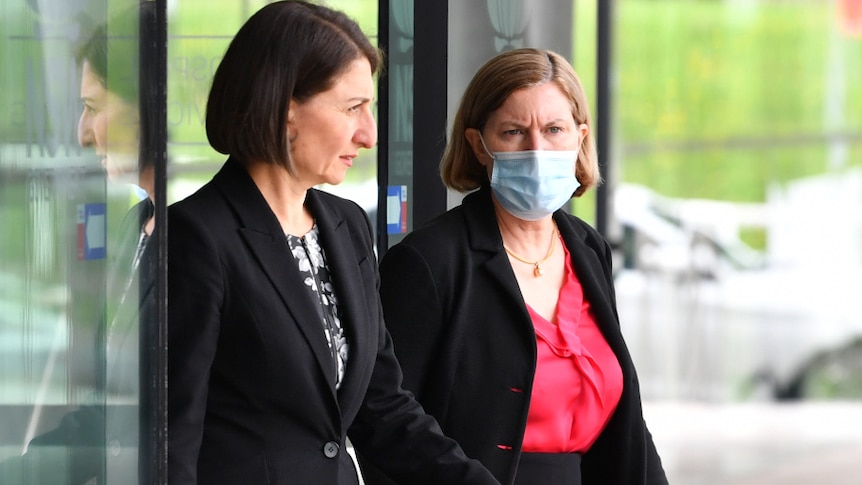 Gladys Berejiklian and NSW Chief Health Officer Dr Kerry Chant walking into a COVID-19 media conference.