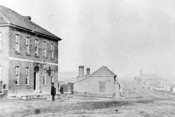 Archive photo of Oatlands' main road in black and white at turn of last century