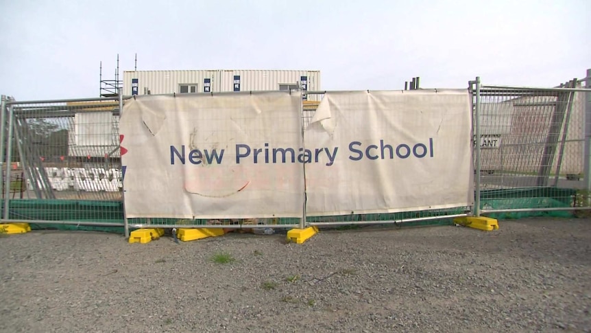 A building site with a sign saying new primary school.