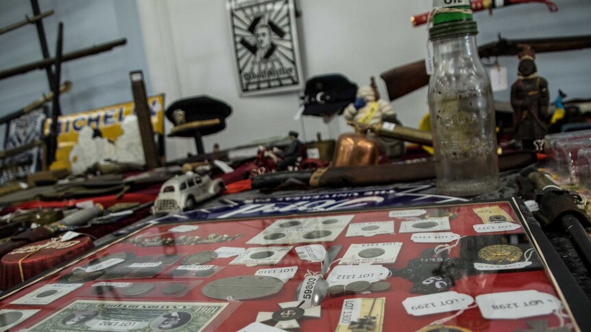 An assortment of relics at auction for military memorabilia.