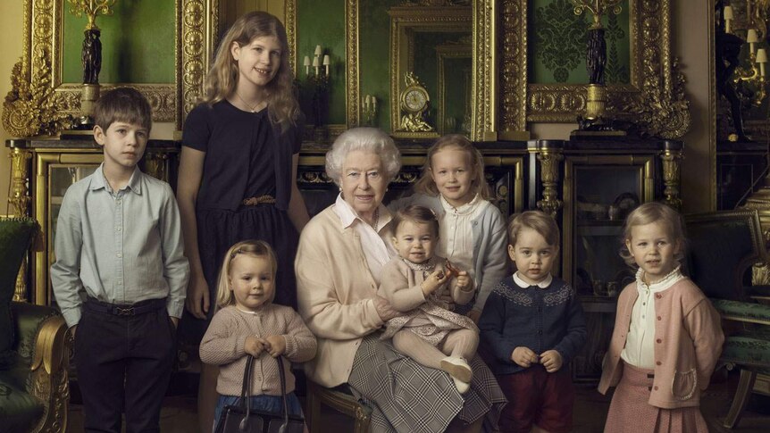 Queen Elizabeth II and various royal children pose for an official portrait in Windsor Castle
