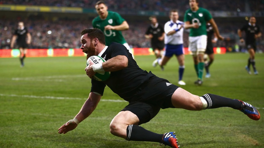 New Zealand's Ryan Crotty scores the match-winning try against Ireland at Lansdowne Road.