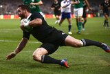 New Zealand's Ryan Crotty scores the match-winning try against Ireland at Lansdowne Road.