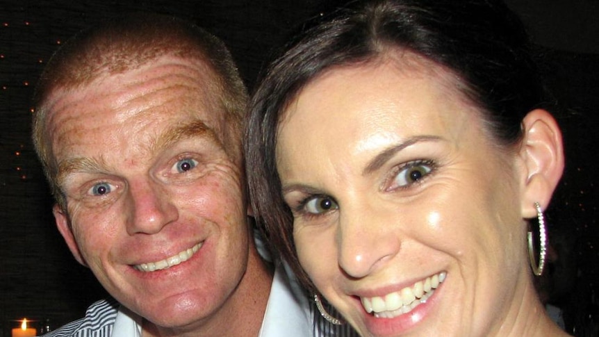 Detective Senior Constable Damian Leeding and his wife Sonia pose for a photo at a function