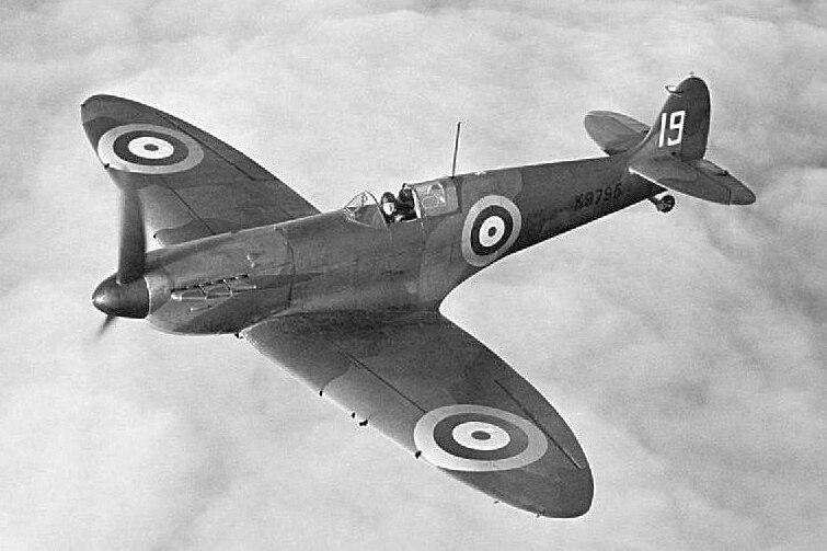 Black and white print of a spitfire flying