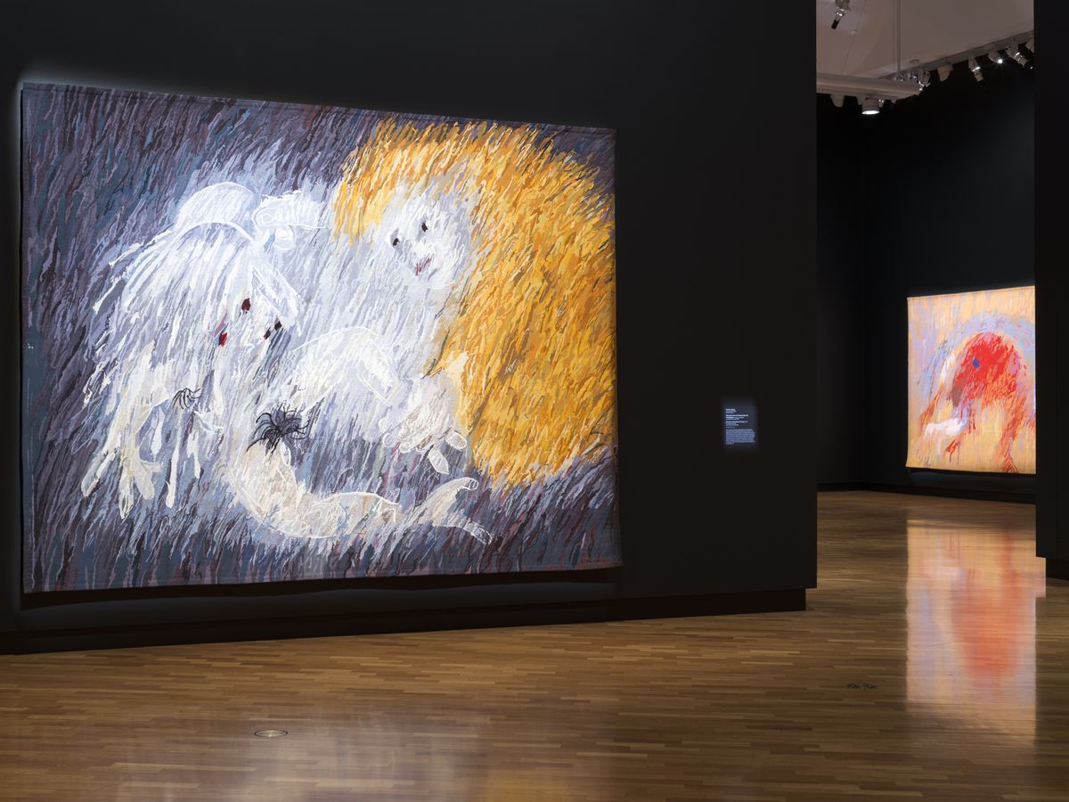 A large tapestry depicting a man laying his hands on another person to heal them.