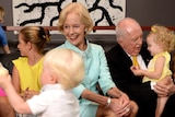 Dame Quentin and Michael Bryce surrounded by their grandchildren in Brisbane.