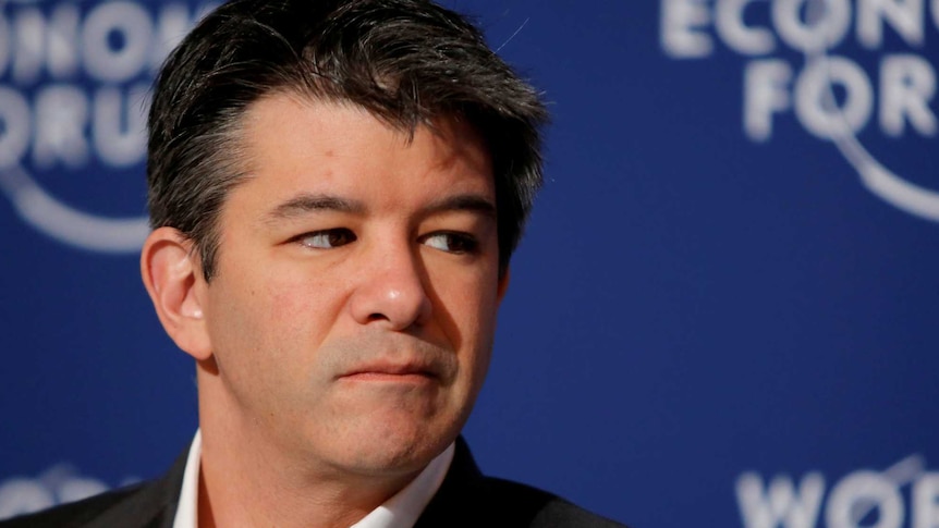 Travis Kalanick frowns and looks to his left (screen right). Tight headshot.