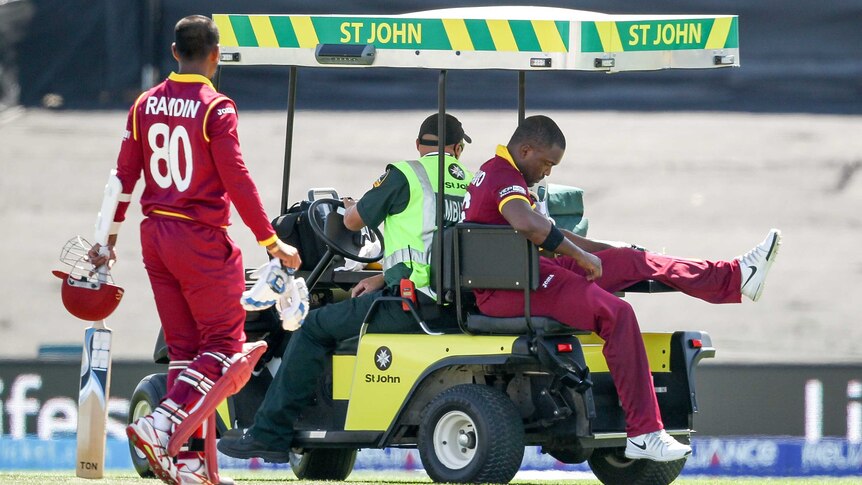 West Indies' Darren Bravo leaves the ground injured against Pakistan