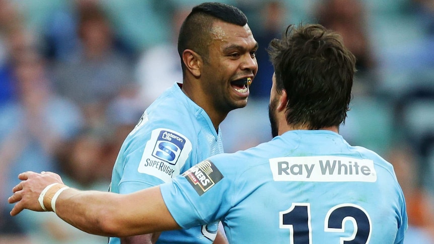 Kurtley Beale celebrates a try for the Waratahs