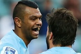 Kurtley Beale celebrates a try for the Waratahs