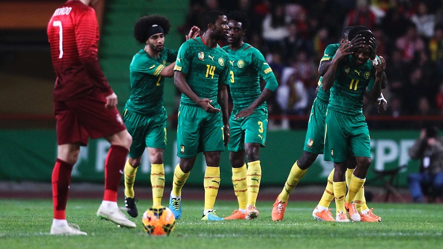 Cameroon celebrate goal against Portugal