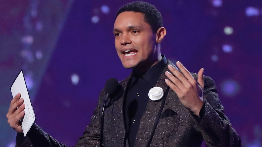 Trevor Noah presents the award for best comedy album at the 60th Grammy Awards.