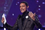 Trevor Noah presents the award for best comedy album at the 60th Grammy Awards.