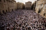 Protest in favour of talks and dialogue in Barcelona. The entire square is full of people in white t-shirts.