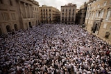 Protest in favour of talks and dialogue in Barcelona. The entire square is full of people in white t-shirts.