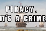 A still from a video displaying the words "Piracy. It's a crime" over a picture of British ships during Australia settlement.