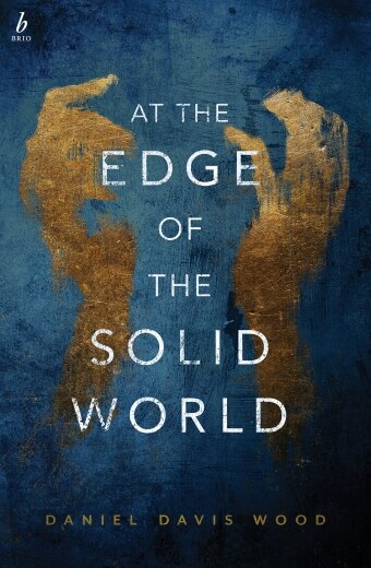 The book cover of At the Edge of the Solid World by Daniel Davis Wood, two abstractly painted hands grasp at the book's title