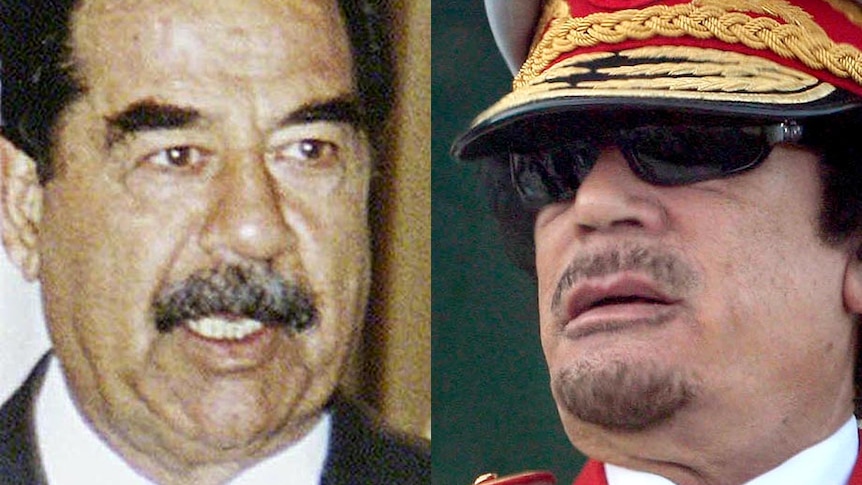 Saddam Hussein and Moamar Gaddafi