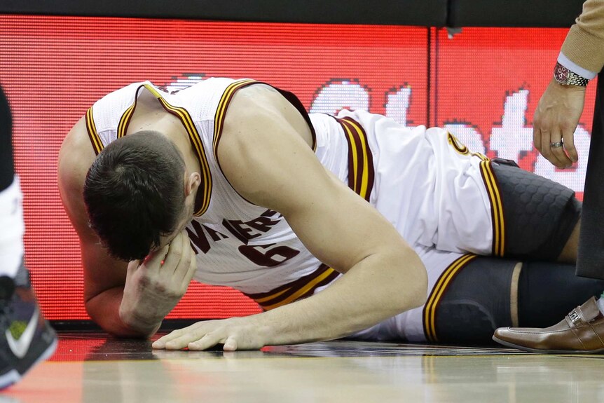 Andrew Bogut's Cleveland Cavaliers debut lasted less than a minute before he broke leg.