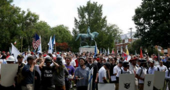 White supremacists gather under a statue of Robert E Lee in Charlottesville.