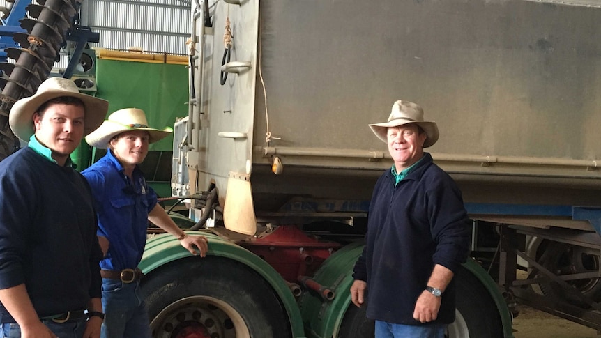 Farmer Andy Mackinnon and his sons.