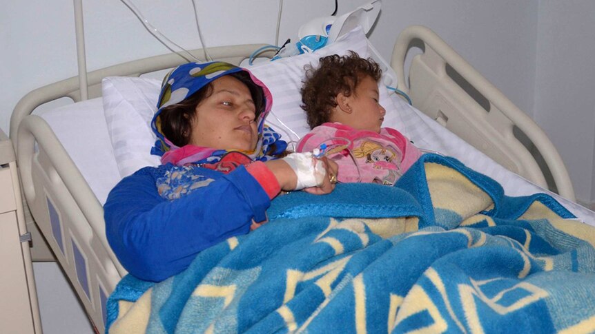 Woman and child injured in suspected Syrian chemical weapons attack