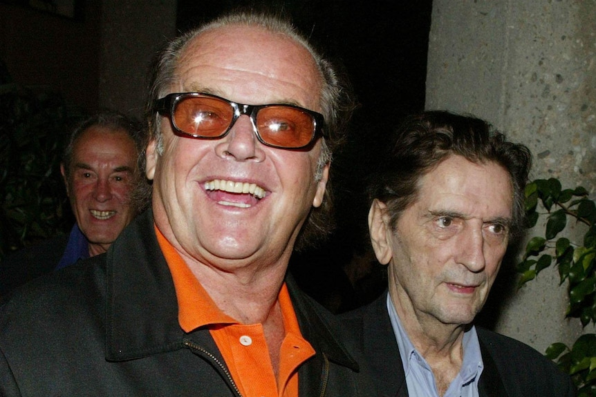 Jack Nicholson and Harry Dean Stanton arrive at a premiere in 2002.