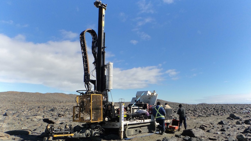 Mechanics set up a drill rig in Antarctica