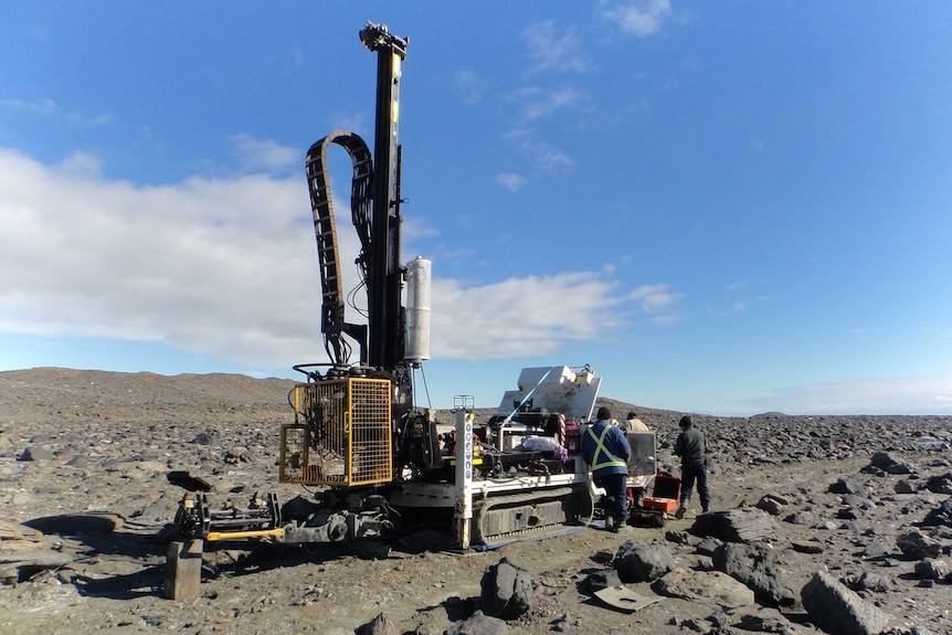 Mechanics set up a drill rig in Antarctica