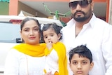 The Singh family pose for a photo while on holiday in India