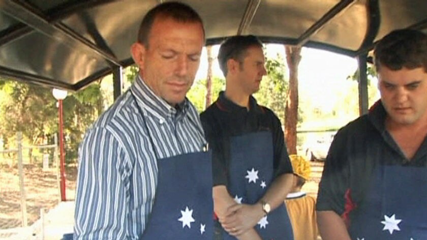 TV still of Tony Abbott at a barbeque in Tamworth
