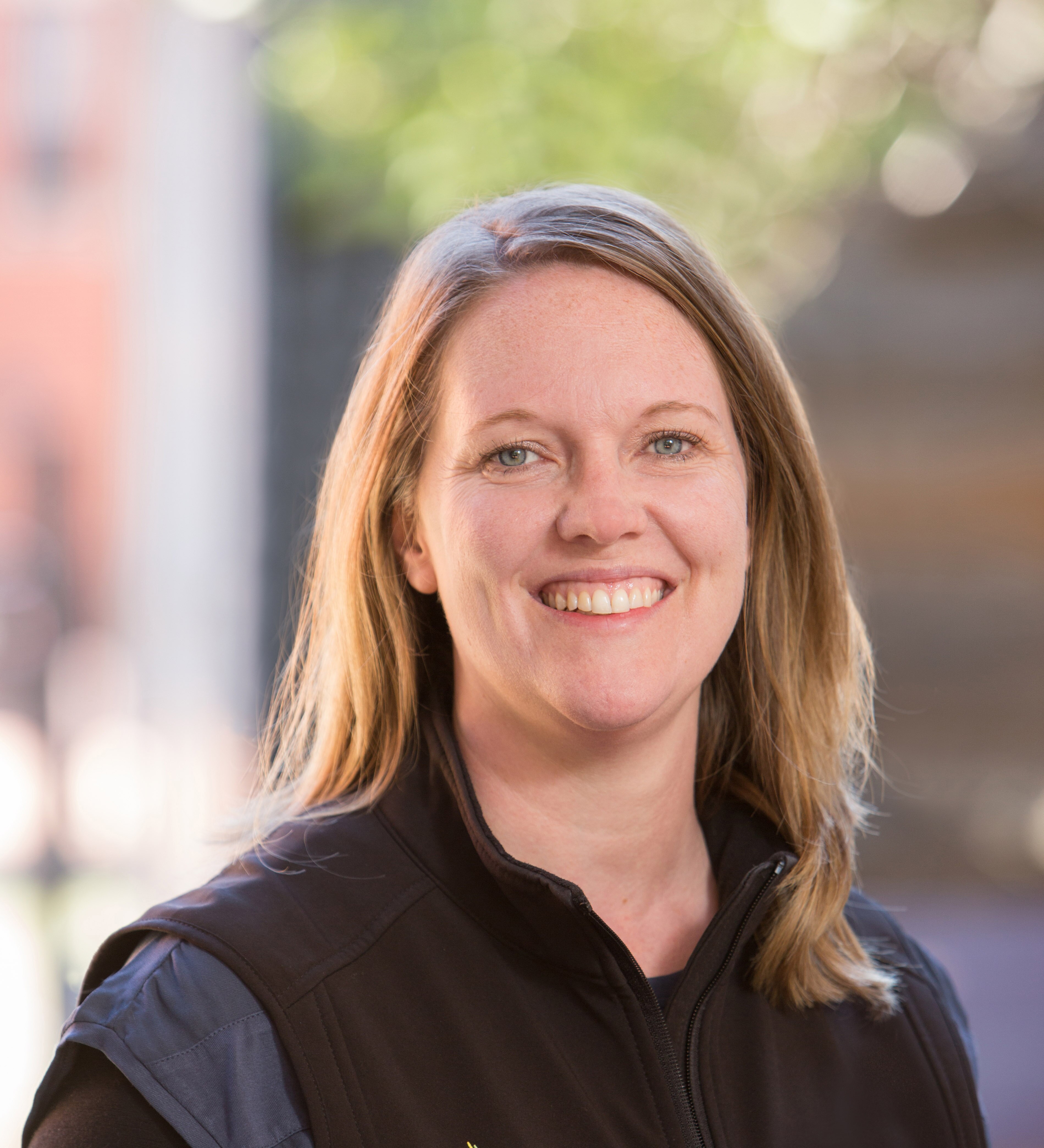 Lauren smiles at the camera