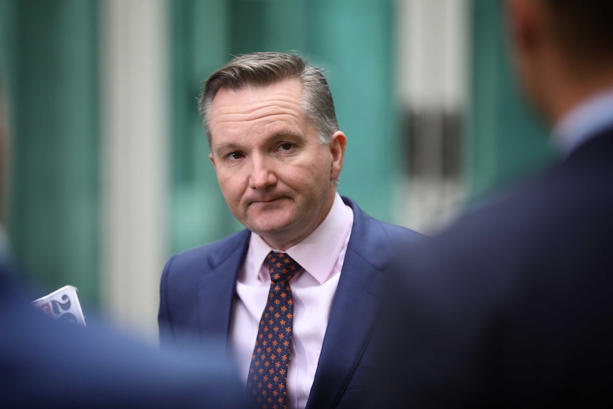 Shadow Treasurer Chris Bowen takes a question at a press conference