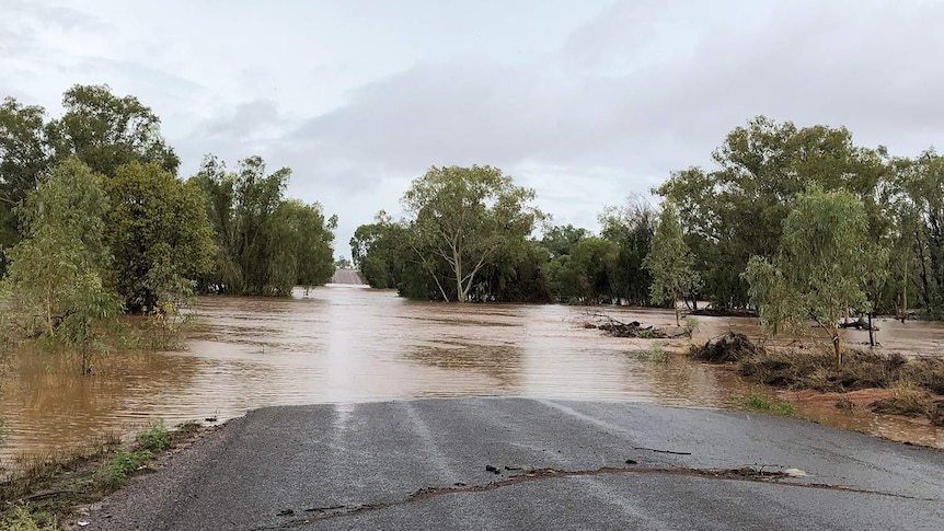 Flooded Cloncurry River over a sealed road in north-west Queensland on February 1, 2019.