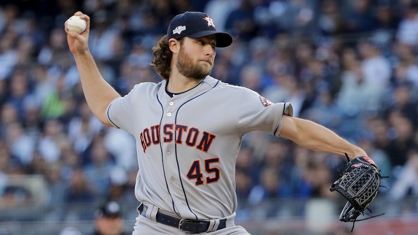 Geritt Cole of the Houston Astros prepares to throw a baseball