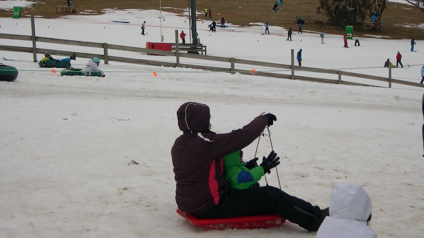 Fun on a toboggan at Selwyn Snowfields in NSW Aug 2012