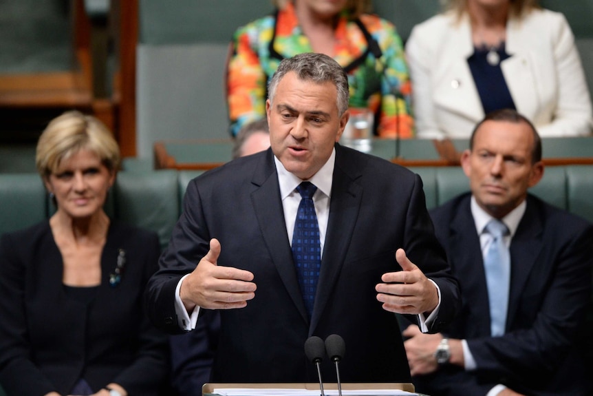 Joe Hockey delivers budget as Tony Abbott listens