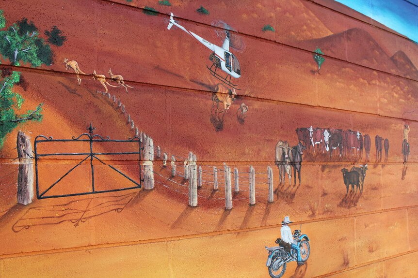 The cattle muster features in the Alice Springs School of the Air mural.
