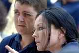 Schapelle Corby (R) and Renae Lawrence (L) sit together during a ceremony inside Kerobokan prison.