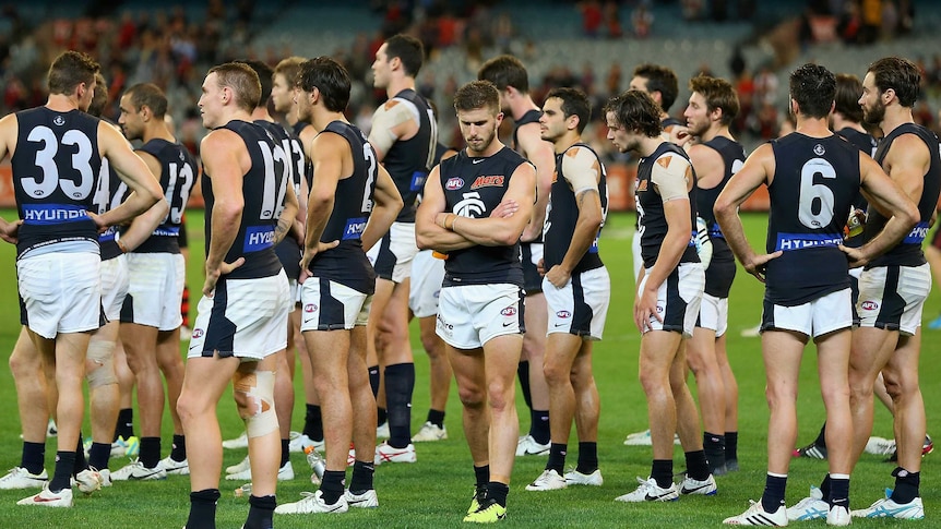 Marc Murphy and Carlton look dejected