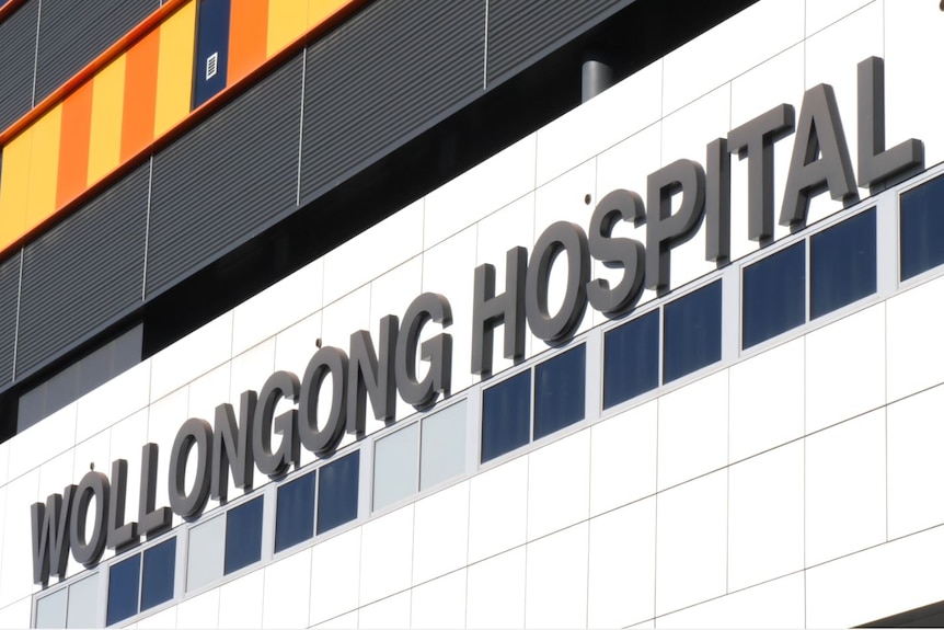 close up of building with "wollongong hospital" written on it