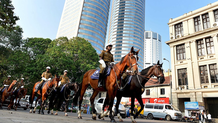 Sri Lankan police on horseback patrol ahead of CHOGM.