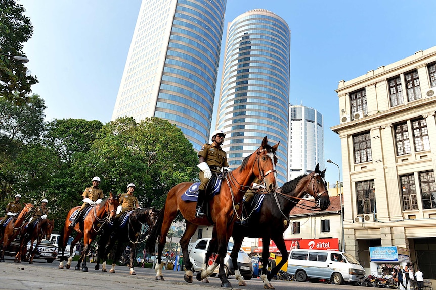 Sri Lankan police on horseback patrol ahead of CHOGM.