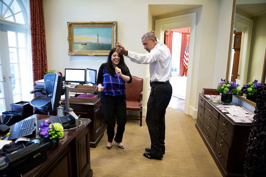 President Barack Obama dancing with his personal aide