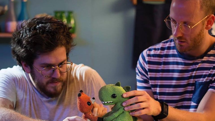 Andrew Goldsmith and Bradley Slabe working with their crochet puppets.