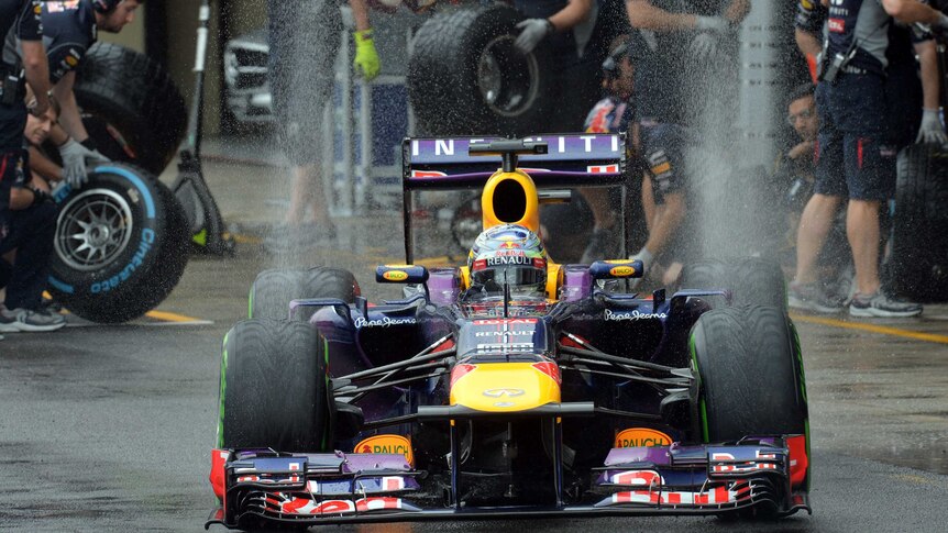 Sebastian Vettel qualifies fastest for Brazil in the rain