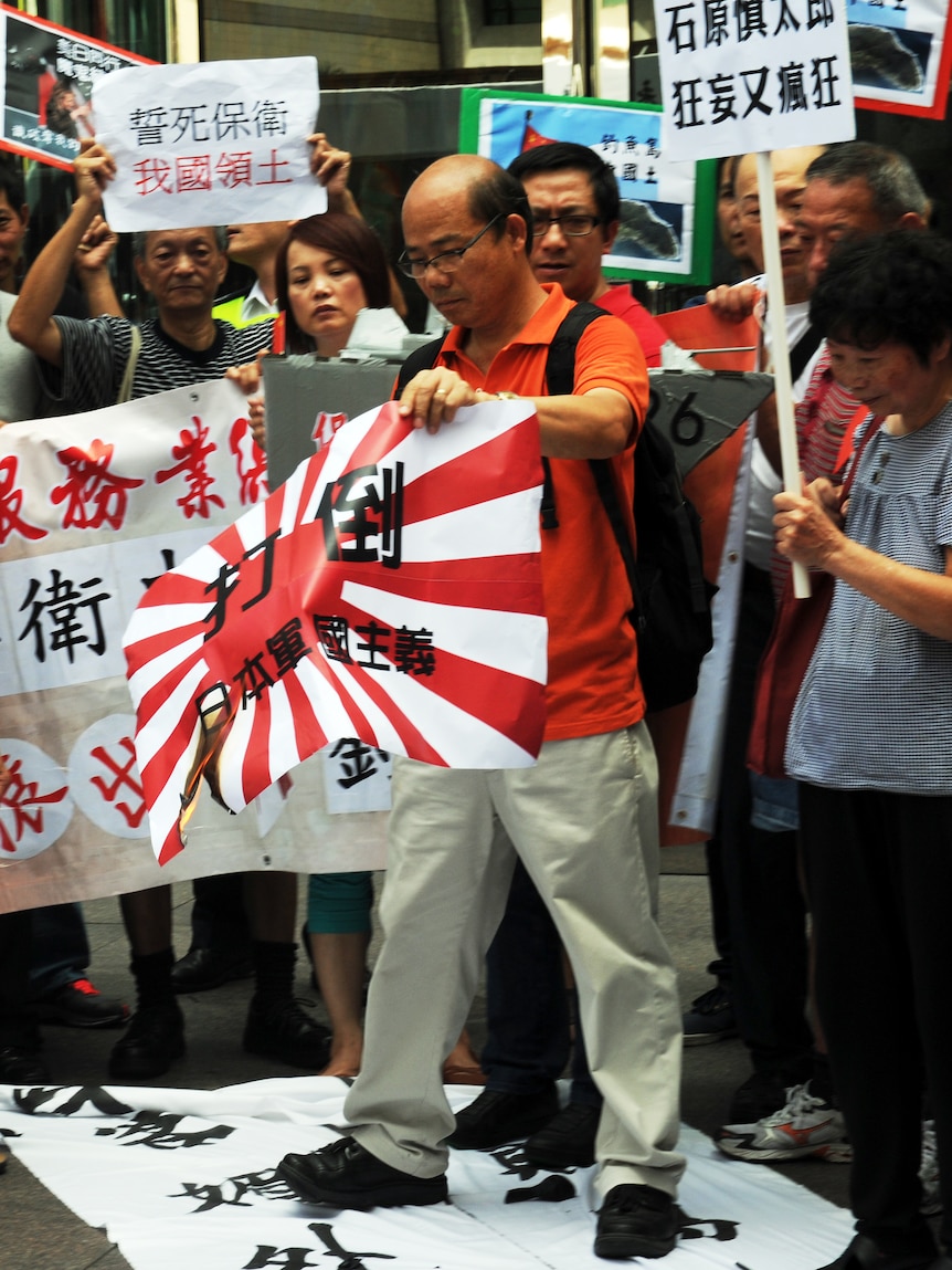 Pro-China activists rally during an anti-Japan protest in Hong Kong