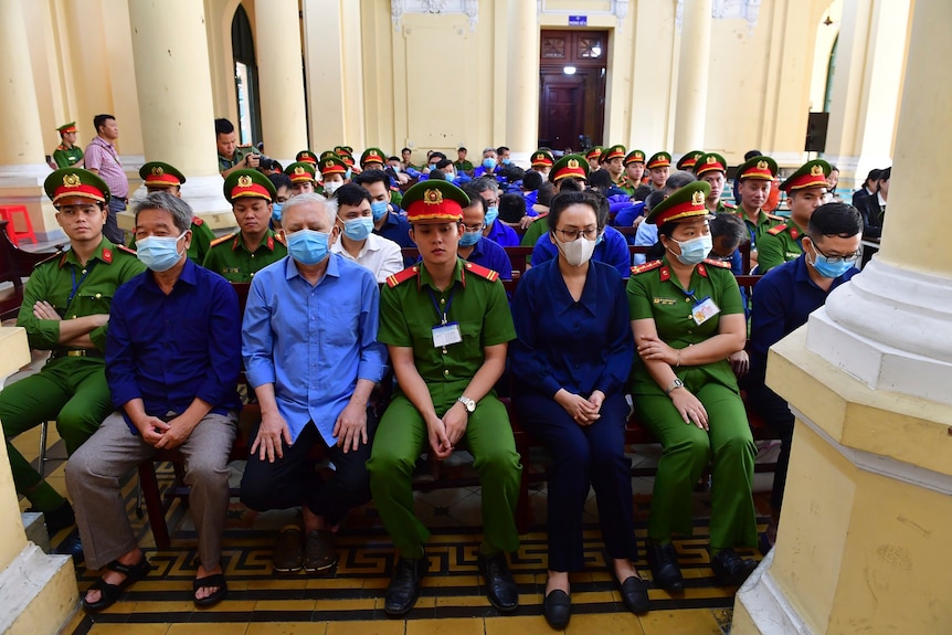 Defendants attend a trial in Vietnam.